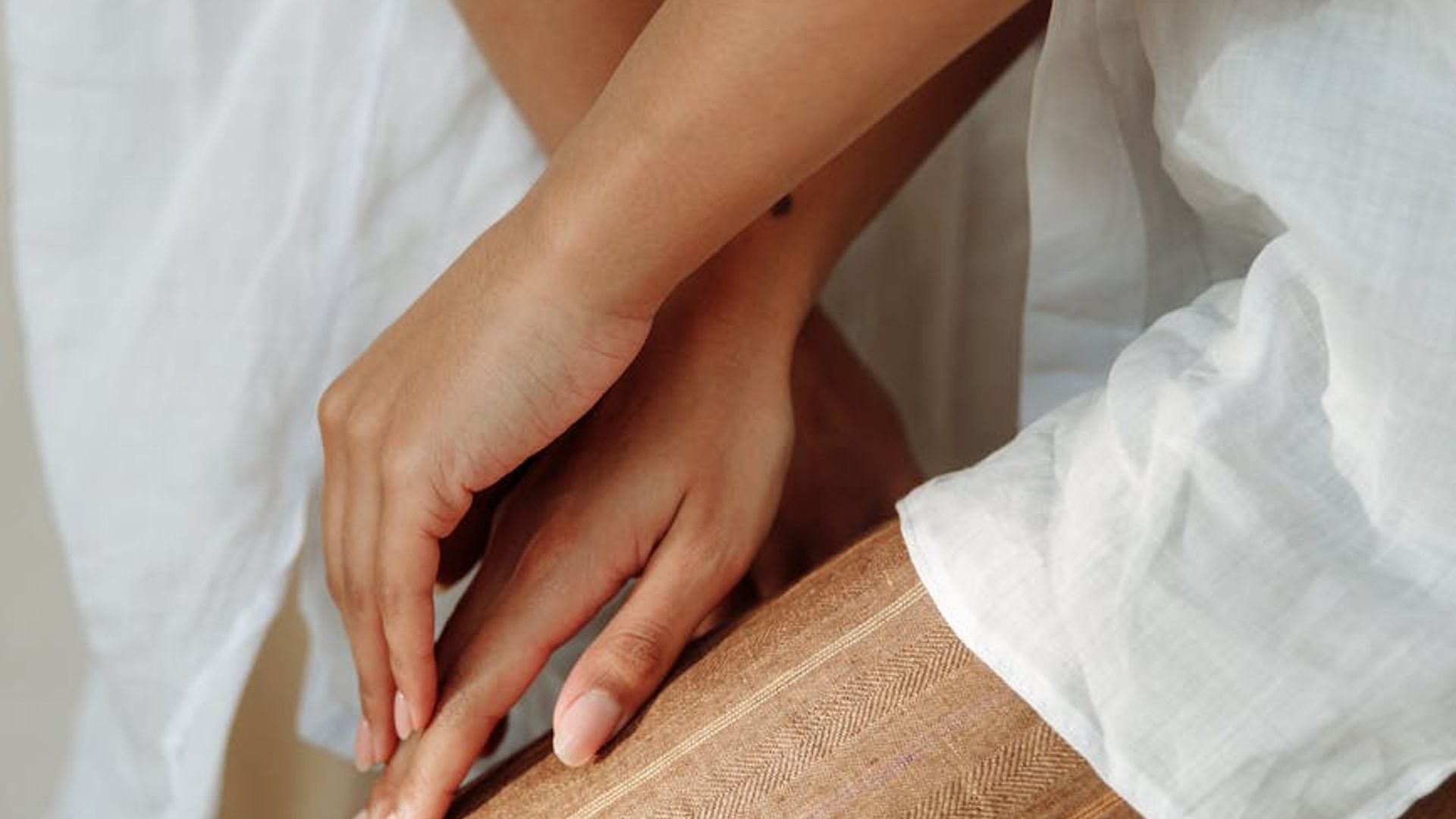 Minimalist dark room with soft natural light, ideal for focused practice.